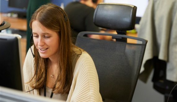 Contact centre team member on the phone to a member