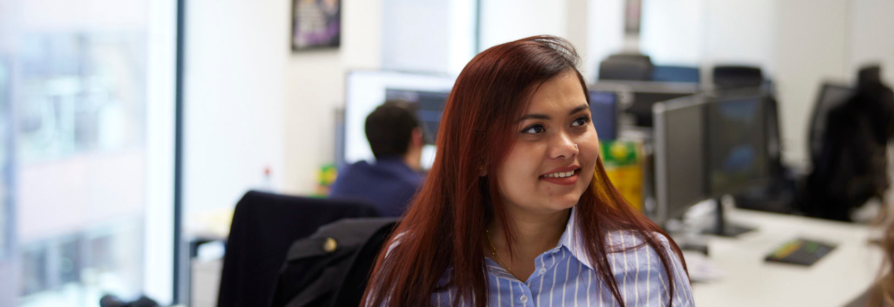 Amina Mimi smiling in the PPF office