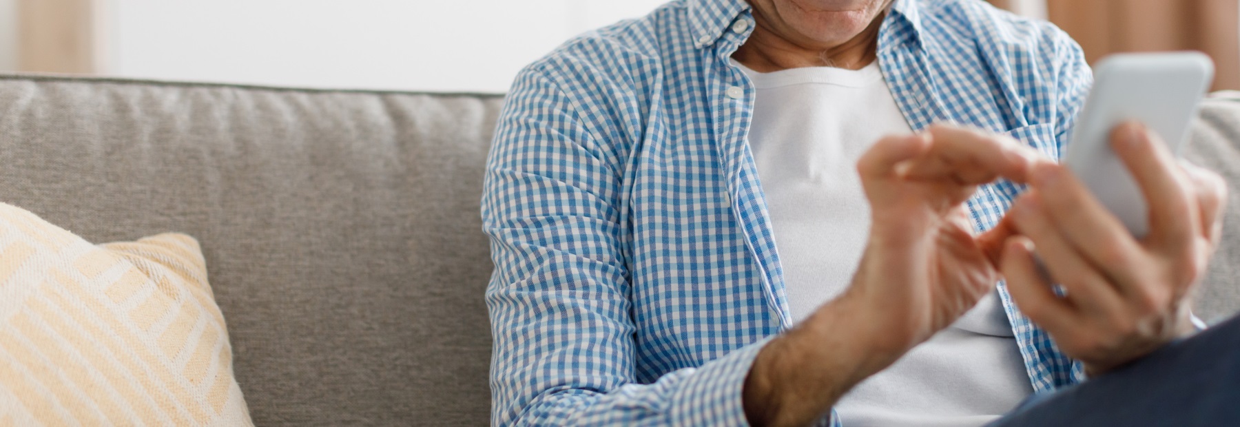 Member reading information on mobile phone